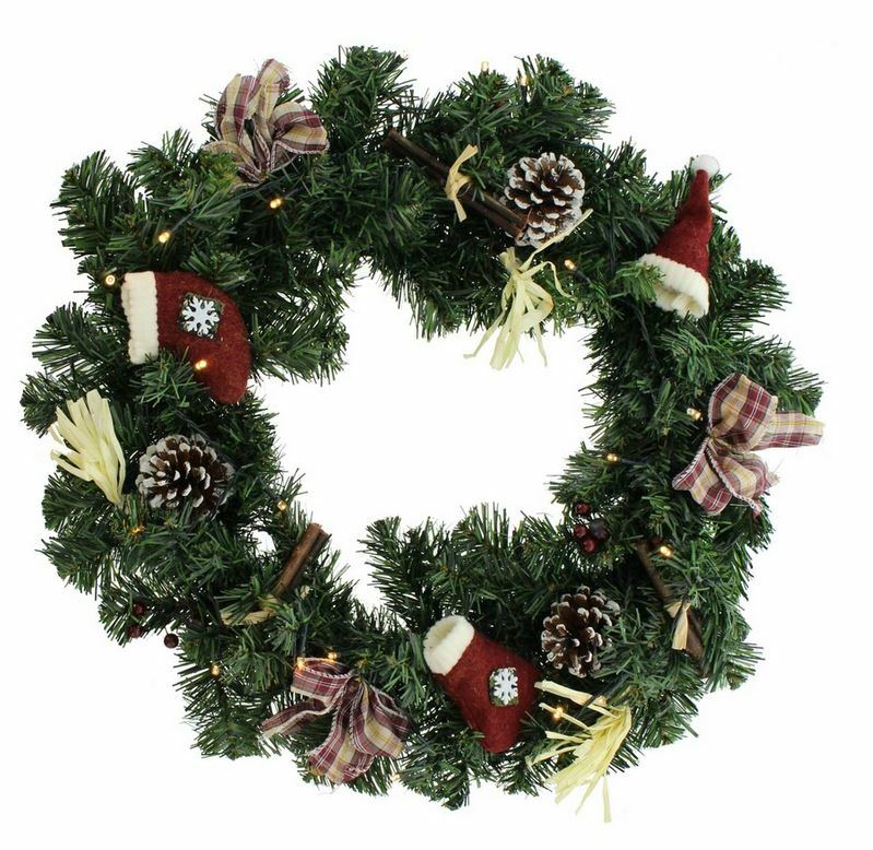 Weihnachtstürkranz, dekoriert und beleuchtet