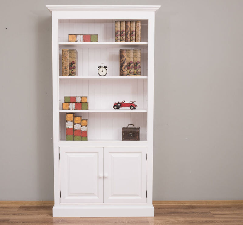 Weißes Bücherregal mit Unterschrank