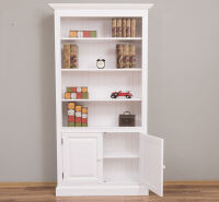 Weißes Bücherregal mit Unterschrank