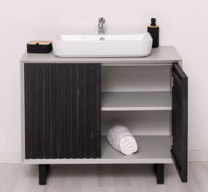 Kleiner Waschbecken-Unterschrank in Lamellenoptik