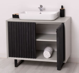 Kleiner Waschbecken-Unterschrank in Lamellenoptik